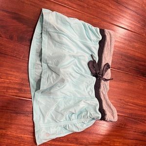 Light blue Lululemon skirt with attached shorts size 4.